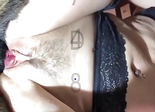 Masked chick in black lingerie enjoys doggy pounding with canine pet