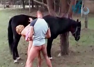 Mature zoophile slut gets a mouthful of cum from a horse and her fuckmate