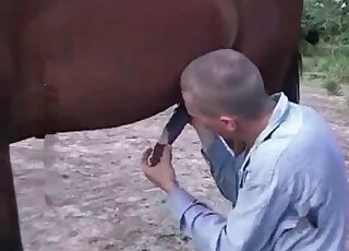 Filthy bitch deepthroats huge black cock of stallion on cam