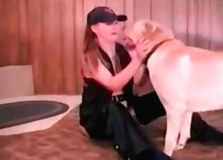 Active MILF lets a big canine use his cock in her needy cunt