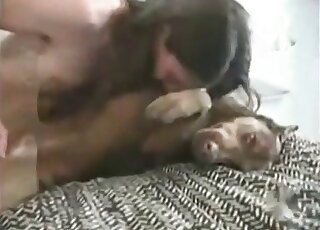 Shameless zoophile guy teases and fucks his female dog on his bed